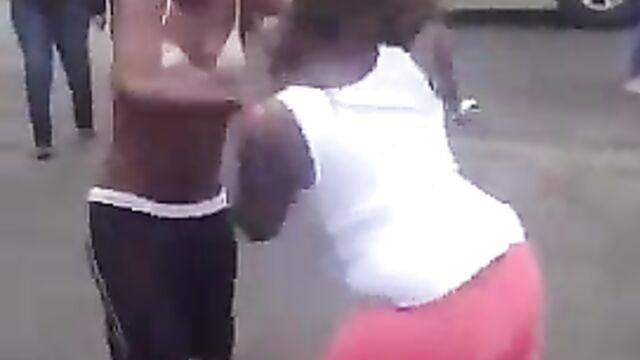 2 women caught fighting, showing ass - 1 image