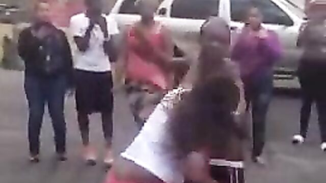2 women caught fighting, showing ass