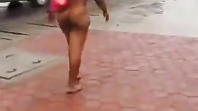 Lady with big breasts strips naked and runs mad in public after allegedly having sex with a man - 1 image
