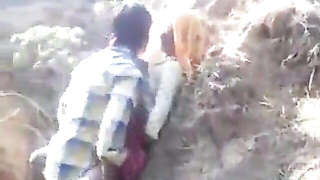 Horny couple caught having sex in public in a valley