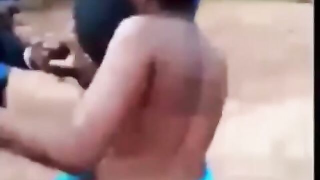 Lady Stripped Naked And Beaten In Public For Sleeping With Married Man - 1 image