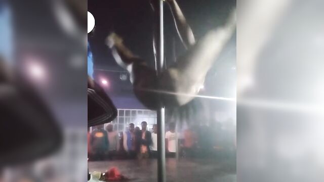 Naked ebony stripper & pole dancer entertaining guests at an nightclub - 3 image