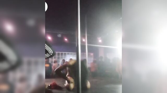 Naked ebony stripper & pole dancer entertaining guests at an nightclub - 4 image