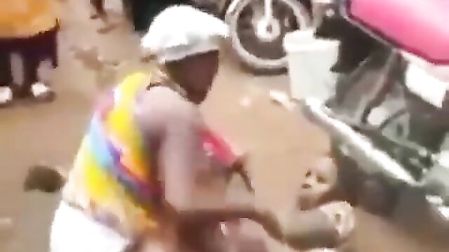 Angry wife beats and strips sidechick naked in the market for sleeping with her cheating husband - 1 image