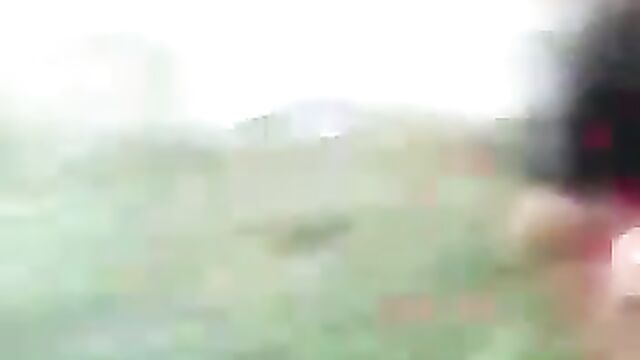 Boobs exposed as 2 women fight on grass in public - 1 image