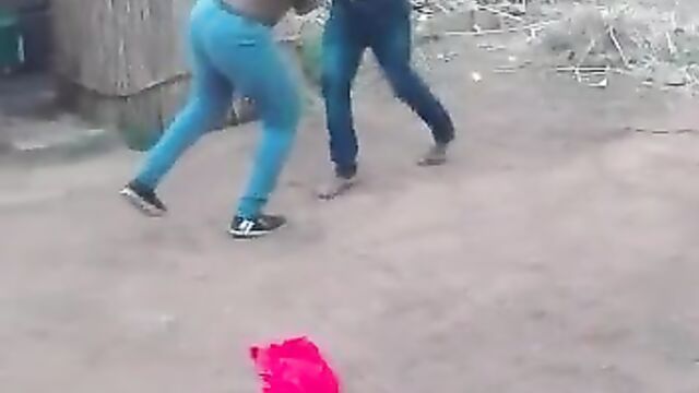 Boobs out as old man strips chick while fighting in public