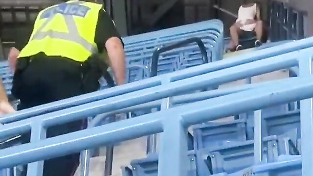 Police arrest couple caught having sex in public during a game - 3 image