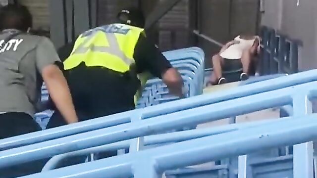 Police arrest couple caught having sex in public during a game - 5 image