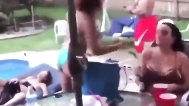 Girl shoots her rival while another chick gives blow job in the background! - 1 image