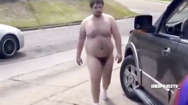 Naked man tries to get into a dude’s truck and gets beaten