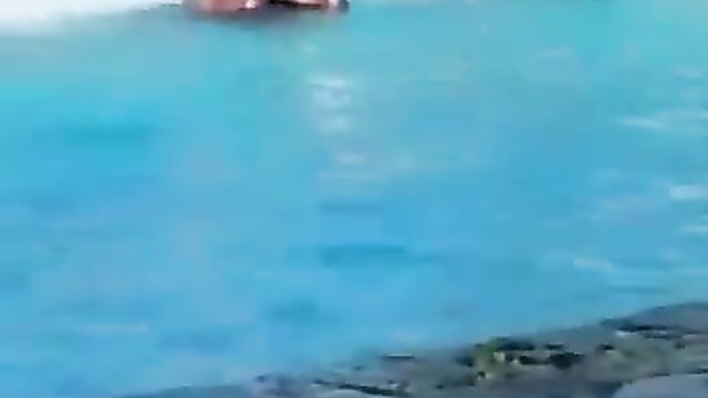 Kenyan Guy Caught Fingering And Fucking Girlfriend In The Pool In Public - 1 image