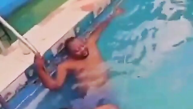 Boobs Out As Nigerian Couple Get Caught Swimming Naked In A Pool In Public - 1 image