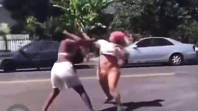 Boobs Out In Public As 2 Girls Fight Over A Boyfriend's Money On The Road - 1 image