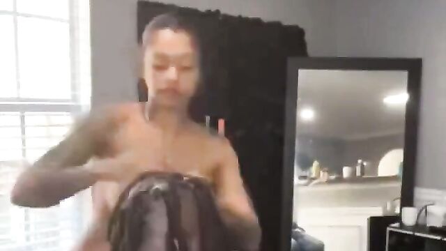 Woman Doing Hair Naked In Public - 3 image