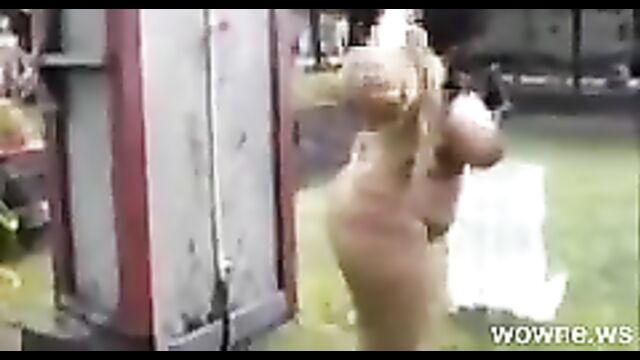 African Woman Showing Her Big Breasts In Public - 3 image