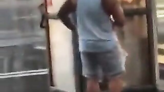 Couple Caught Having Doggy Style Sex In Phone Booth In Public - 1 image