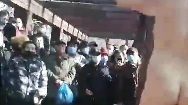 Pussy Exposed As Naked Mad Chinese Woman With Bushy Pussy Gets Caught Entertaining A Crowd In Public - 1 image