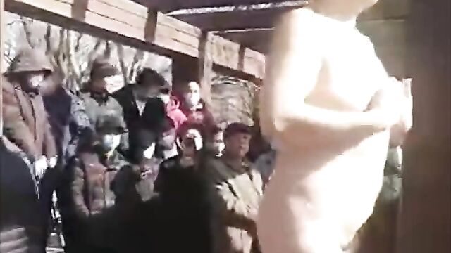 Pussy Exposed As Naked Mad Chinese Woman With Bushy Pussy Gets Caught Entertaining A Crowd In Public - 5 image