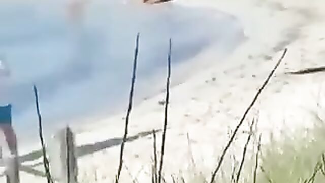 Crazy Couple Having Sex On The Beach In Front Of Passersby In Public - 5 image