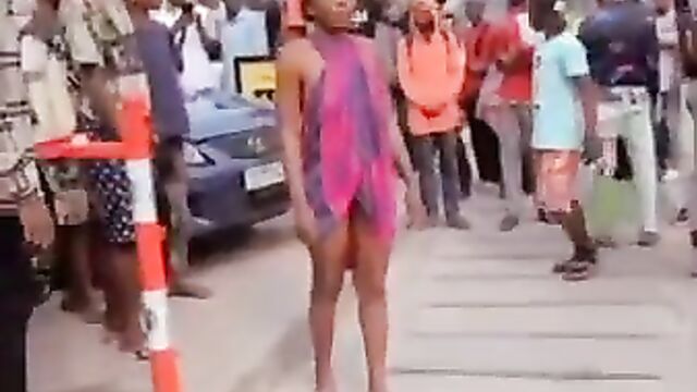 African Woman With Bushy Pussy Strips Naked And Runs Mad In Public, Showing Boobs And Ass - 1 image