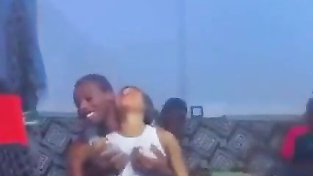 Alleged Yahoo Boy Caught Squeezing Olosho Girl's Breasts In Public (Full Video 18+) - 1 image