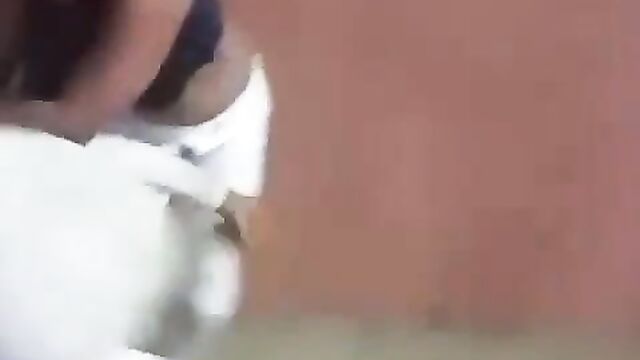 Boobs Out As 2 Street Girls Get Caught Fighting Over A Man And Falling Into Gutter In Public (Full Video 18+) - 1 image