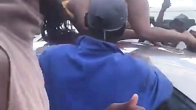 Pussy Exposed In Public As Mzansi Woman Gets Caught Showing Her Toto On A Car Roof In Public (Full Video 18+) - 1 image