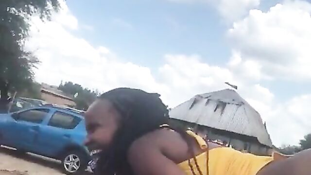 Pussy Exposed In Public As Mzansi Woman Gets Caught Showing Her Toto On A Car Roof In Public (Full Video 18+) - 5 image