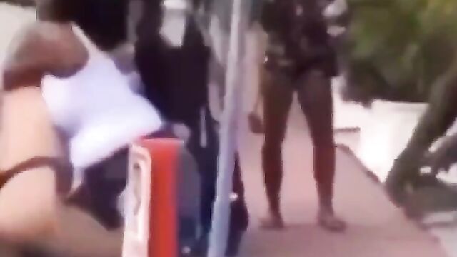 Ass and boobs out as white chick fights black girl in public - 4 image