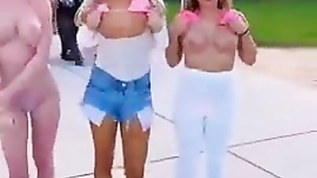 Boobs Out As Girls Go Wild In Public, Distracting Bike Rider - 1 image