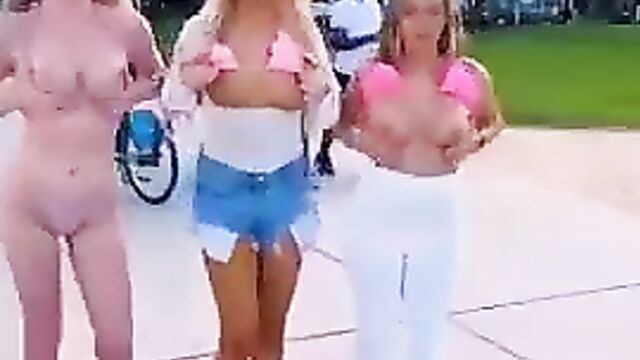 Boobs Out As Girls Go Wild In Public, Distracting Bike Rider - 3 image