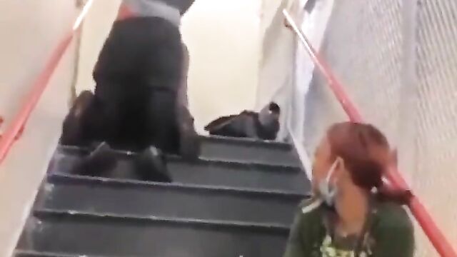 Couple Caught Having Doggy Style Sex On The Staircase In Public - 1 image