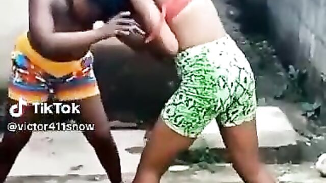 Big Breasts Exposed As Busty Ghanaian Girl Gets Stripped Naked While Fighting Over A Man In Public - 1 image