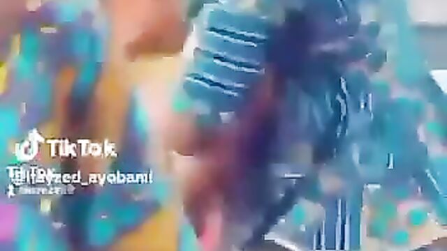 Side Chick Pushes Wife Into Gutter While Fighting Over Her Husband After She Tried To Strip Her Naked In Public - 1 image