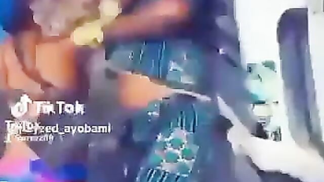 Side Chick Pushes Wife Into Gutter While Fighting Over Her Husband After She Tried To Strip Her Naked In Public