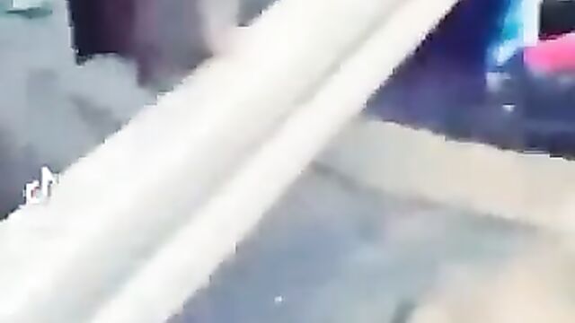 Side Chick Pushes Wife Into Gutter While Fighting Over Her Husband After She Tried To Strip Her Naked In Public - 4 image