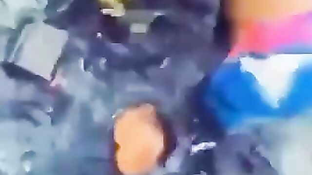 Side Chick Pushes Wife Into Gutter While Fighting Over Her Husband After She Tried To Strip Her Naked In Public - 5 image