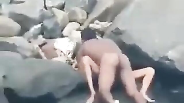 Naked Couple Caught Having Sex By The Seaside In Public - 1 image