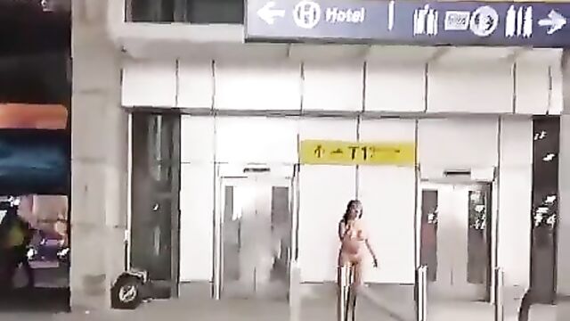 Naked Woman With Small Breasts Caught Harassing Travelers In Public In Airport - 3 image
