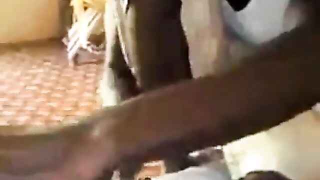 Hausa husband shaving wife’s pussy in public - 1 image