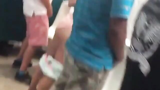 Drunk Miami Dolphins Female Fan With Big Ass Caught Using Men's Toilet - 1 image