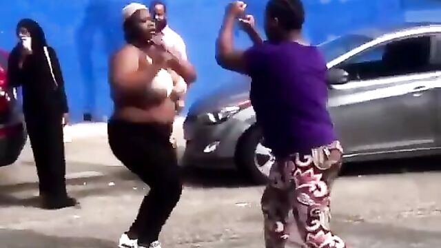 Breasts Pop Out As 2 Black Girls With Big Breasts Get Caught Fighting In Public Over A Rich Man - 4 image