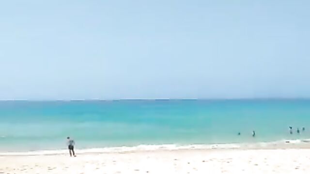 Sex On A Surfboard In Public - 1 image