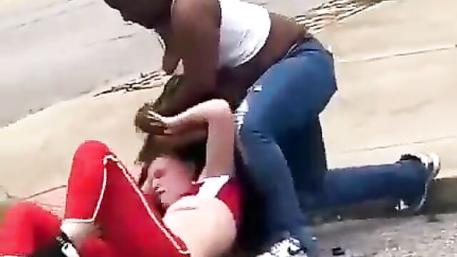 Boobs Out As African American Girl Beats Up Her 2 Opponents While Fighting In Public - 4 image