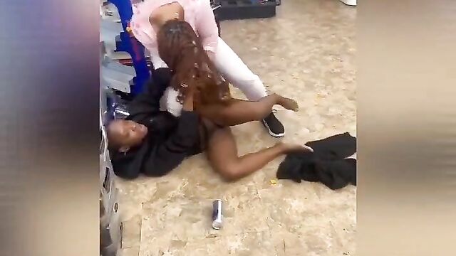 Pussy Exposed In Public As 2 Black Women Get Caught Fighting In A Store - 1 image