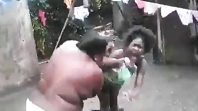 Boobs Out In Public As Half Naked African Woman With Big Breasts And Panties Beats Her Daughter Over Boyfriend
