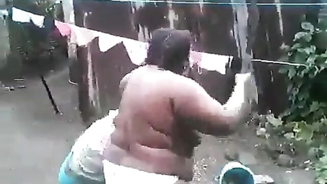 Boobs Out In Public As Half Naked African Woman With Big Breasts And Panties Beats Her Daughter Over Boyfriend - 3 image