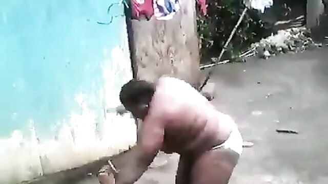 Boobs Out In Public As Half Naked African Woman With Big Breasts And Panties Beats Her Daughter Over Boyfriend - 5 image