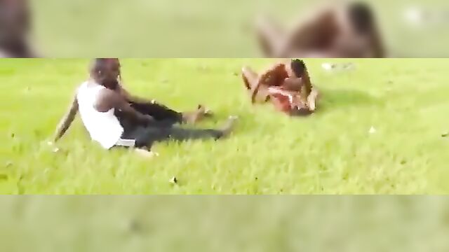 Naked Ebony Couple Caught Having Sex On Grass In Public - 3 image