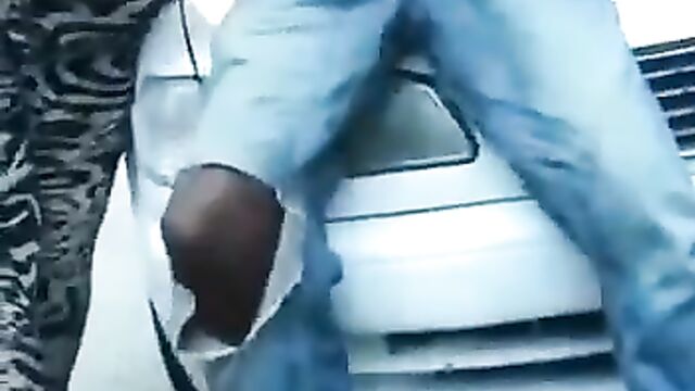 Barbadian Thot Playing With Man’s Dick And Giving Blow Job On Car Bonnet In Public In Broad Daylight - 3 image